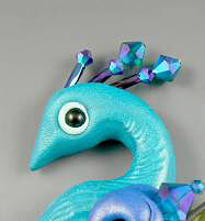 Clay peacock head